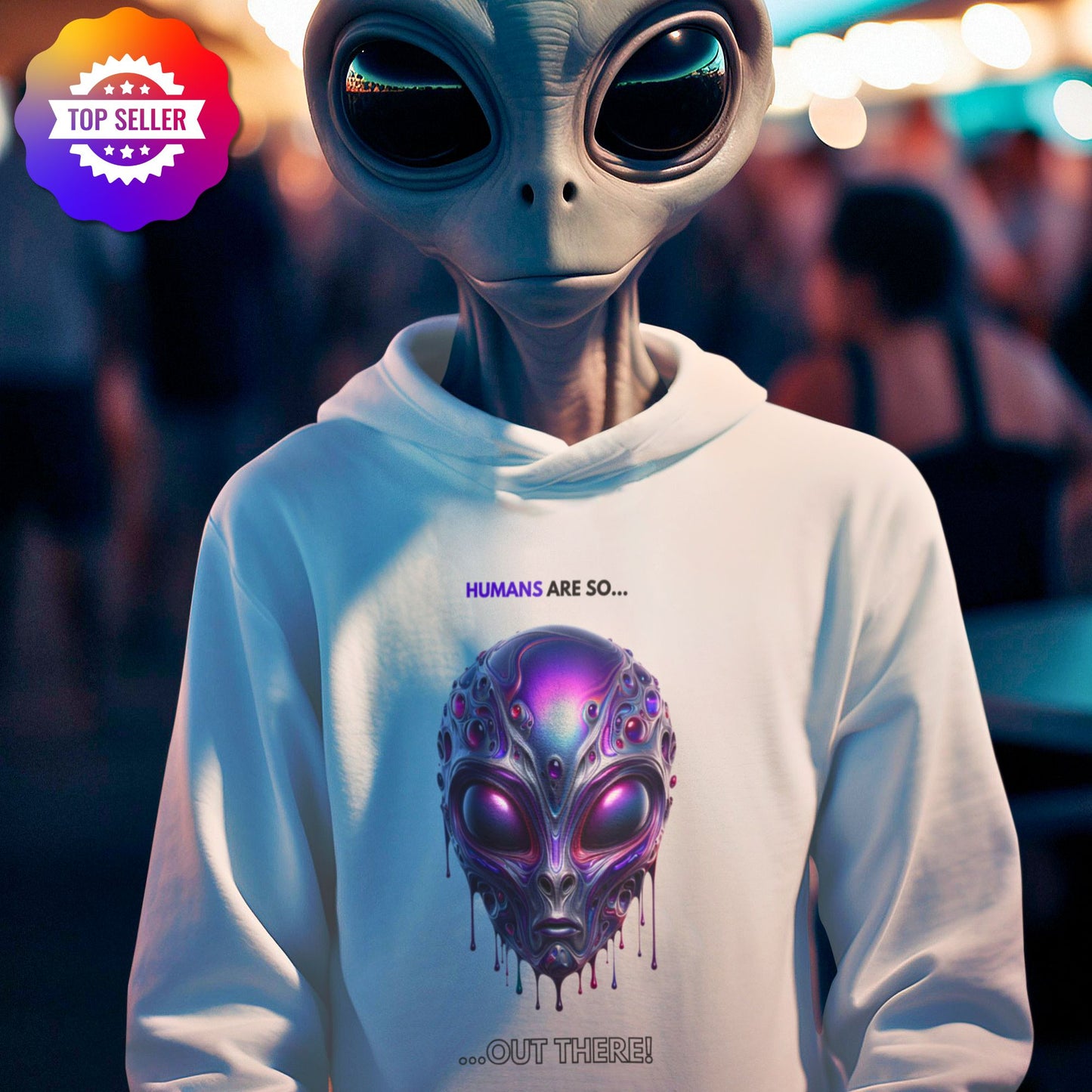 Humans are so out there Alien Hoodie in white, made from organic cotton. Alien showcasing the hoodie.