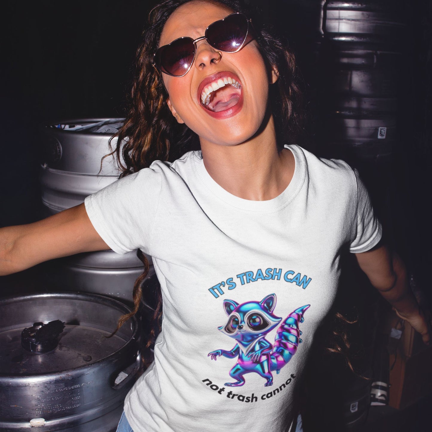 It’s trash can not trash cannot Raccoon Shirt in white, made from organic cotton. Model showcasing shirt in a lifestyle setting.