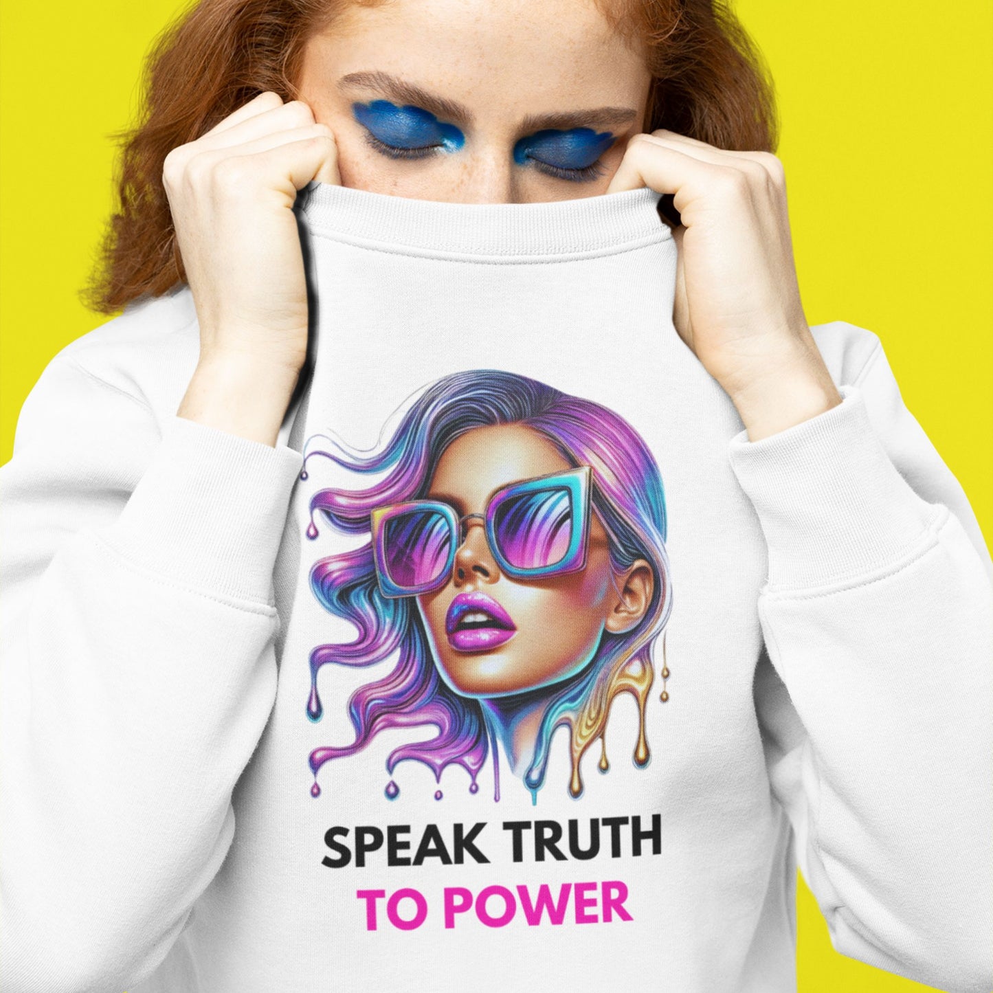 Speak Truth to Power hers Sweatshirt in white, made from organic cotton. Model showcasing close up of front view on a yellow background.