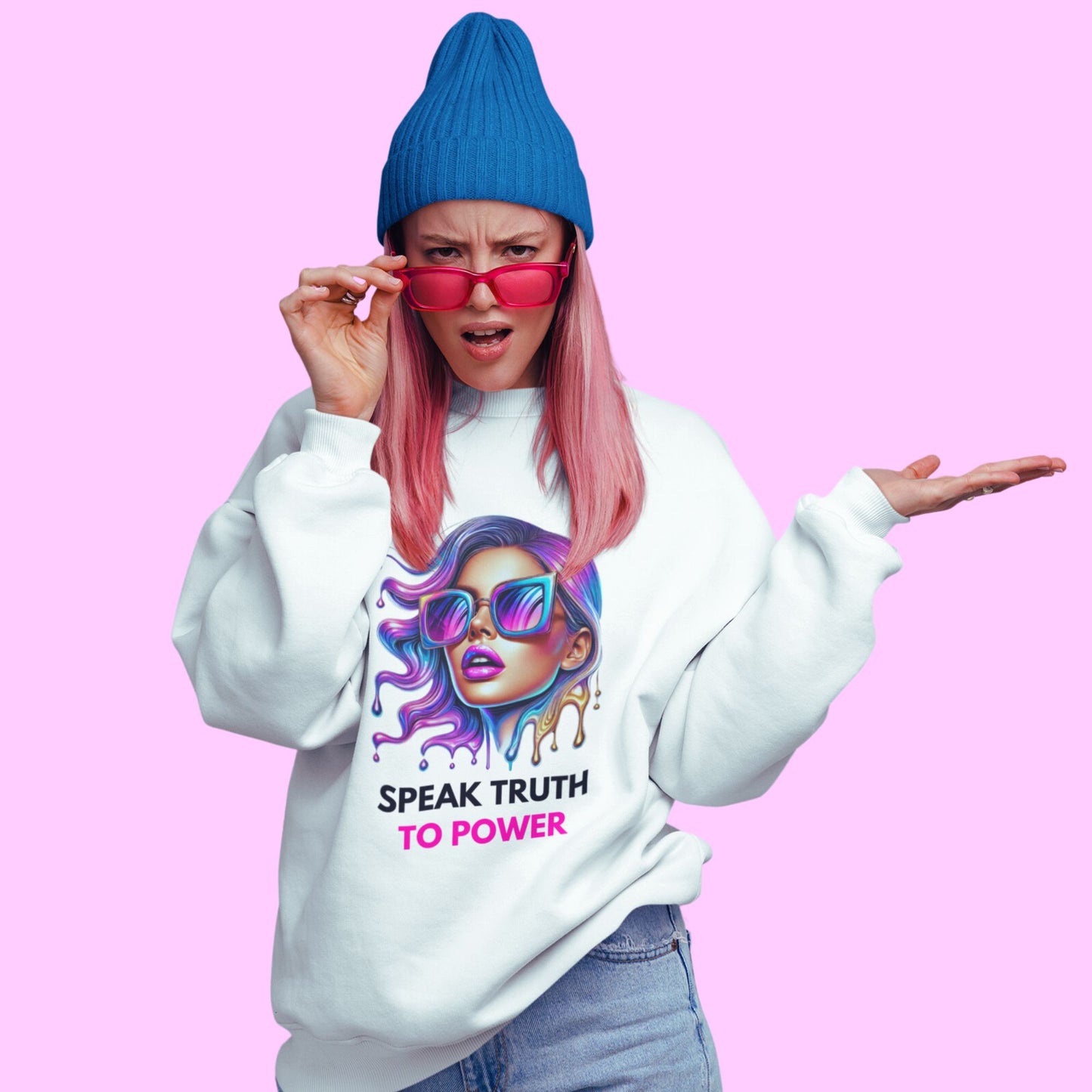 Speak Truth to Power hers Sweatshirt in white, made from organic cotton. Front view of a pink haired female model showing print.