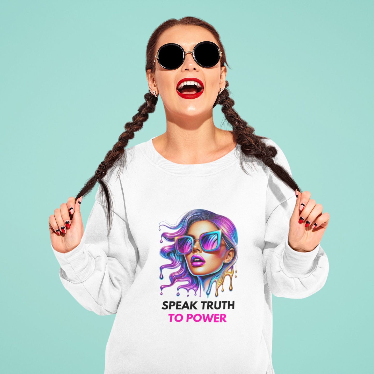 Speak Truth to Power hers Sweatshirt in white, made from organic cotton. Model showcasing sweatshirt while pulling her hair.