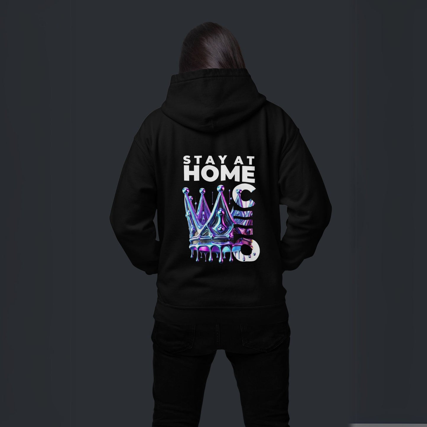Stay at Home CEO Hoodie in black, made from organic cotton. Model showcasing back view on a dark background.