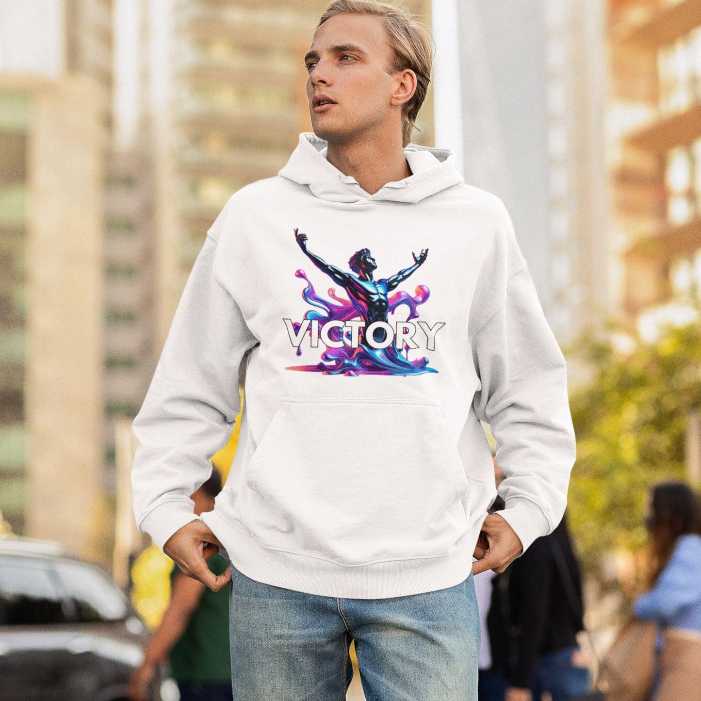 Victory Hoodie in white, made from organic cotton. Blonde male model showcasing hoodie in lifestyle setting.
