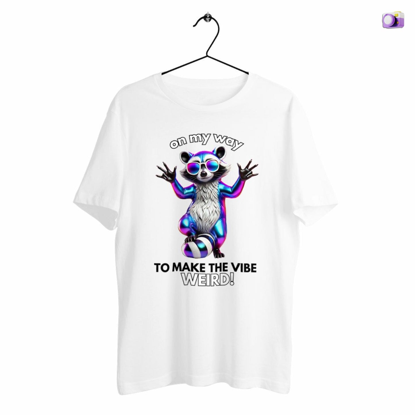 On my way to make the vibe weird Raccoon Shirt in white, made from organic cotton. Front view showing print. Shirt showcased on a hanger.
