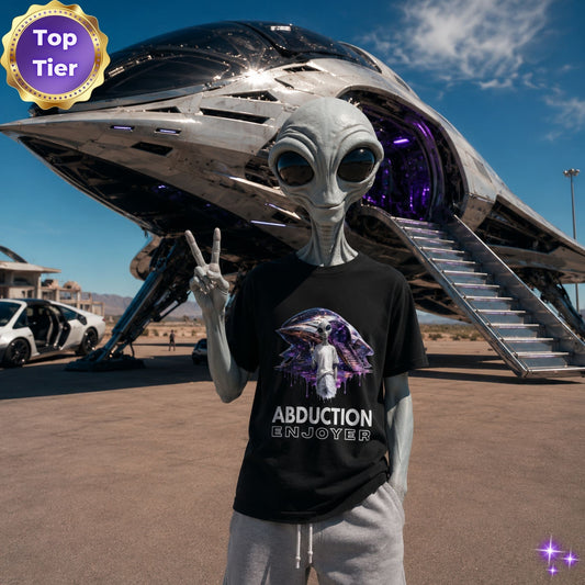 Alien wearing an 'Abduction Enjoyer' t-shirt in front of a large alien spacecraft.