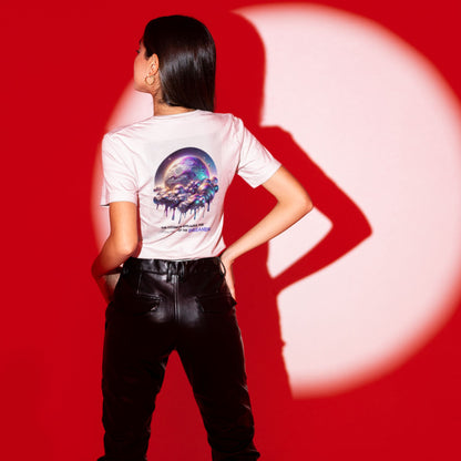 Audacity of the Dreamer Shirt in white, made from organic cotton in conversion. Model in vegan leather pants showcasing shirt on a red studio light.