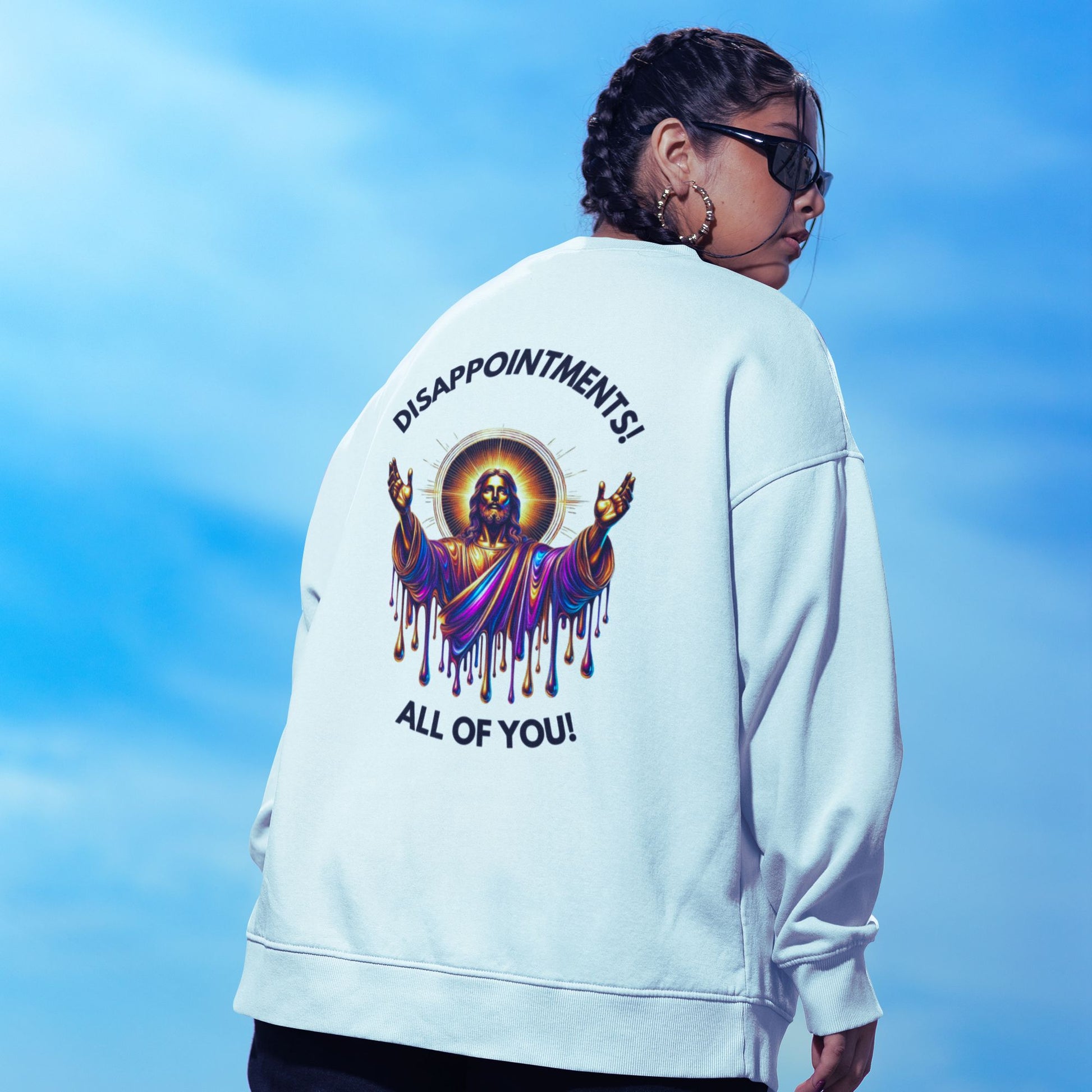 Disappointments all of you Jesus Sweatshirt in white, made from organic cotton. Model showcasing back print in lifestyle setting.