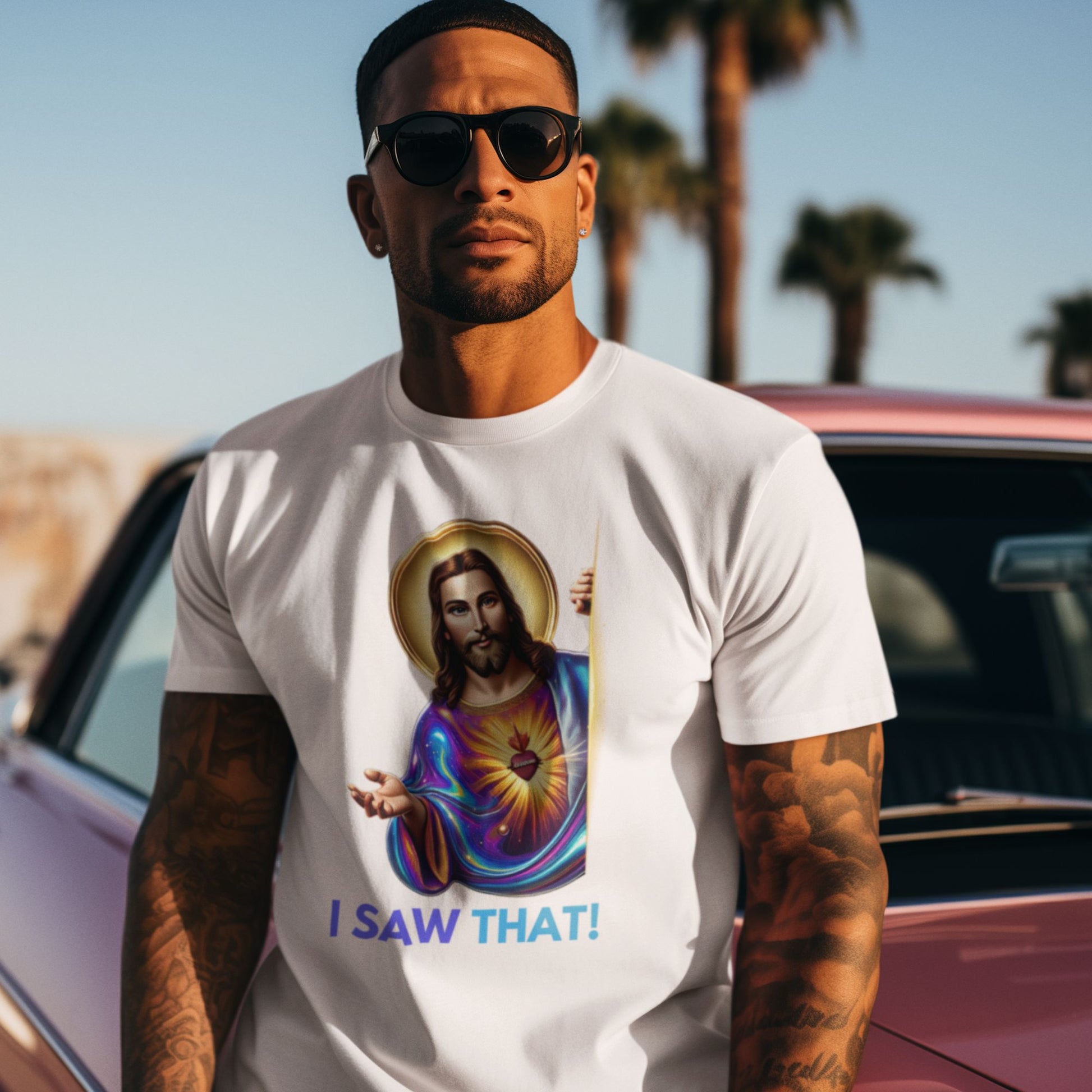 I saw that Jesus Shirt in white, made from organic cotton. Male model showcasing shirt in a lifestyle setting on a beach.
