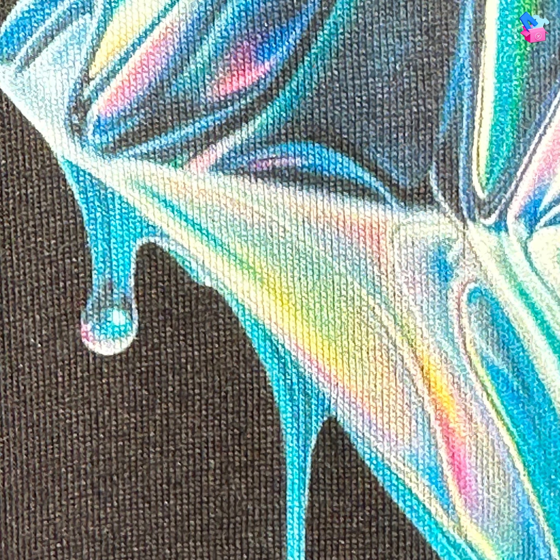 Iconic Meltdown Shirt showcasing the image of a melting diamond in black, made from organic cotton in conversion. Close up of fabric and print.