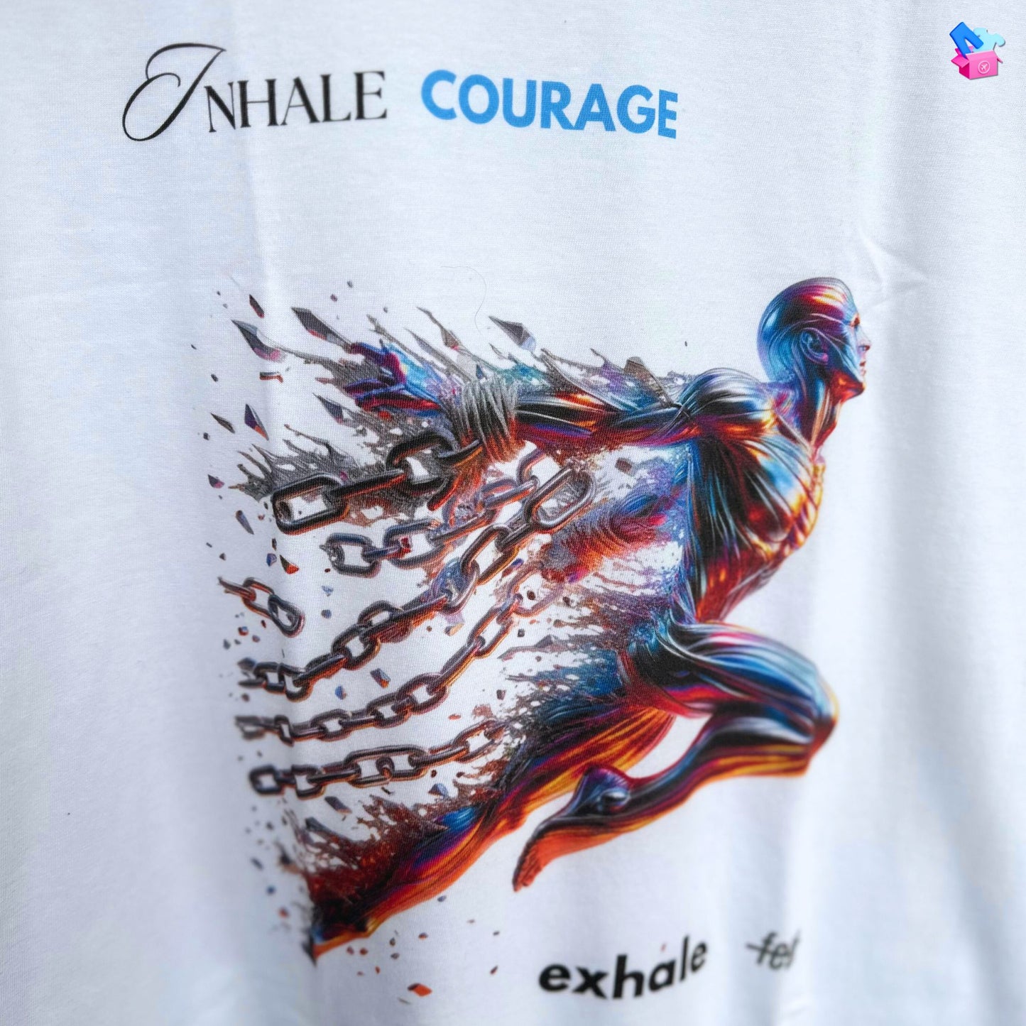 Inhale courage exhale fear Shirt in white, made from organic cotton in conversion. Close up of fabric and print.