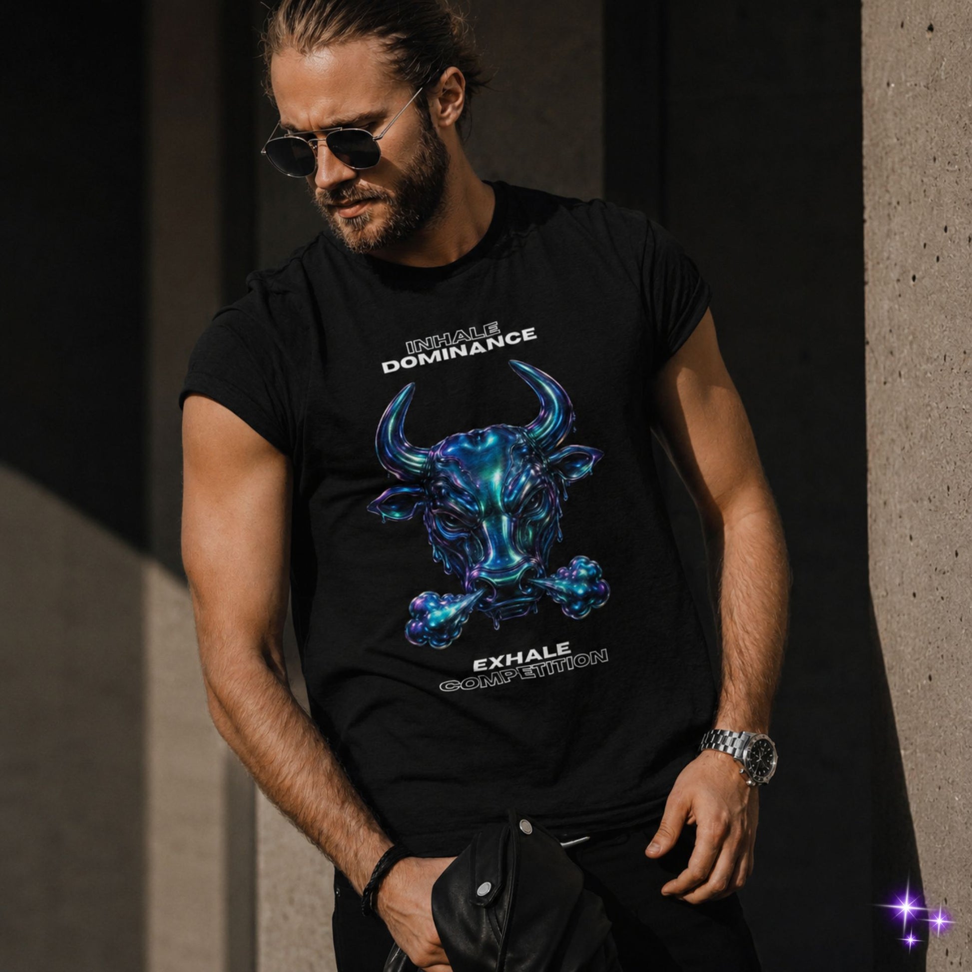 Man wearing a black t-shirt with a blue bull graphic and text, standing on a street.