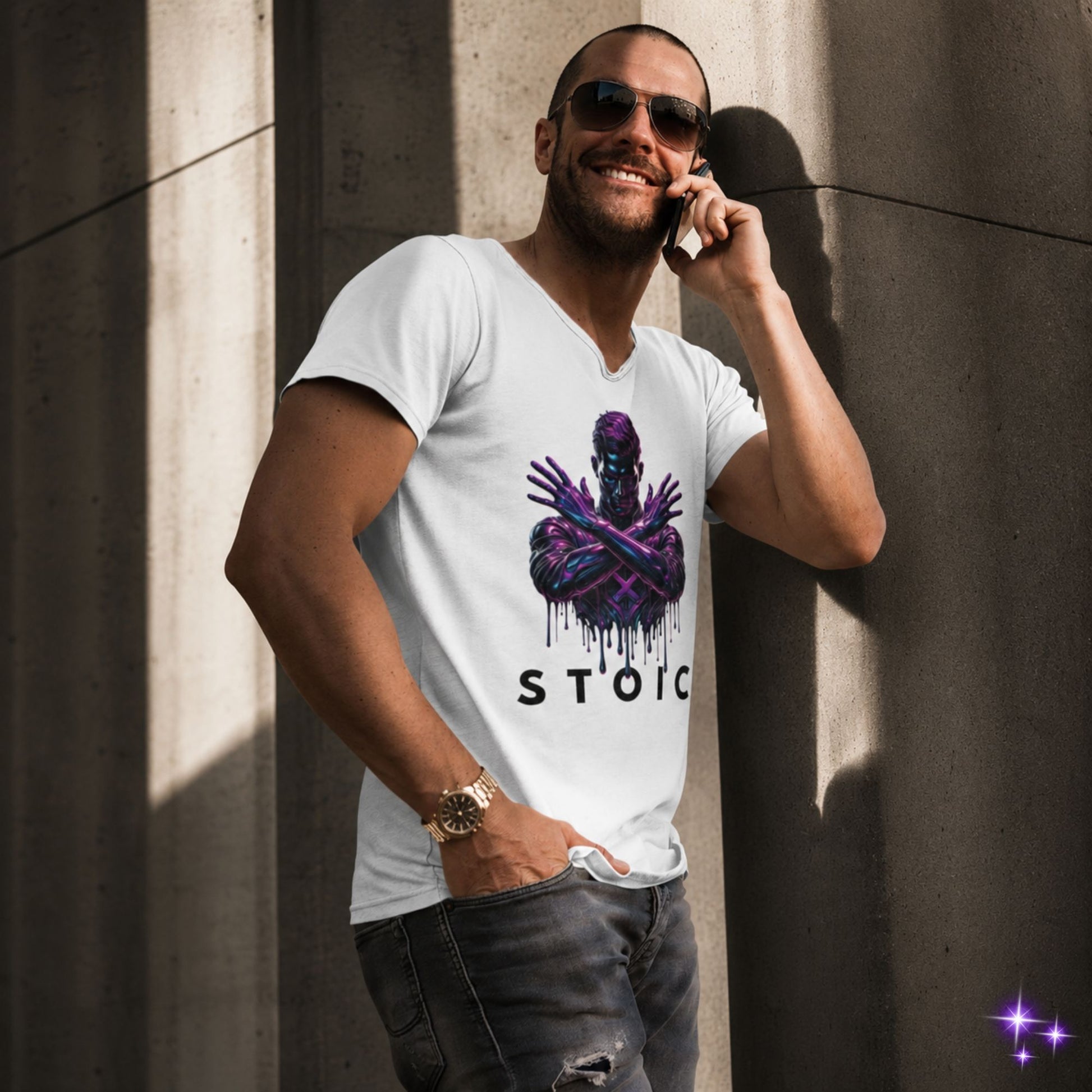 Man wearing a white t-shirt with a graphic design and the word 'STOIC' against a yellow wall.