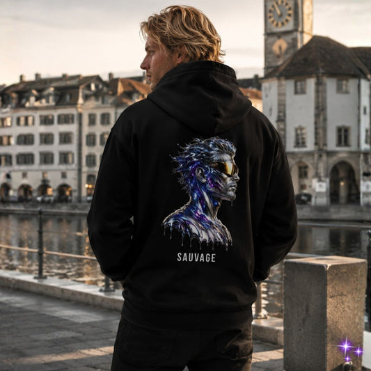 Person wearing a black hoodie with a graphic design and 'SAUVAGE' text, standing in an urban setting.