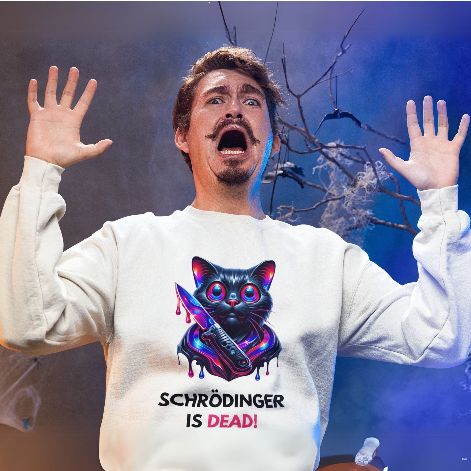 Schrödinger is dead Black Cat Sweatshirt in white, made from organic cotton. Shocked male model showcasing the front view of the sweatshirt in spooky setting.