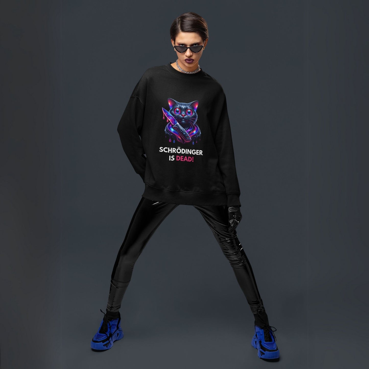 Schrödinger is dead Black Cat Sweatshirt in black, made from organic cotton. Model showcasing the sweatshirt styled with vegan leather leggings.