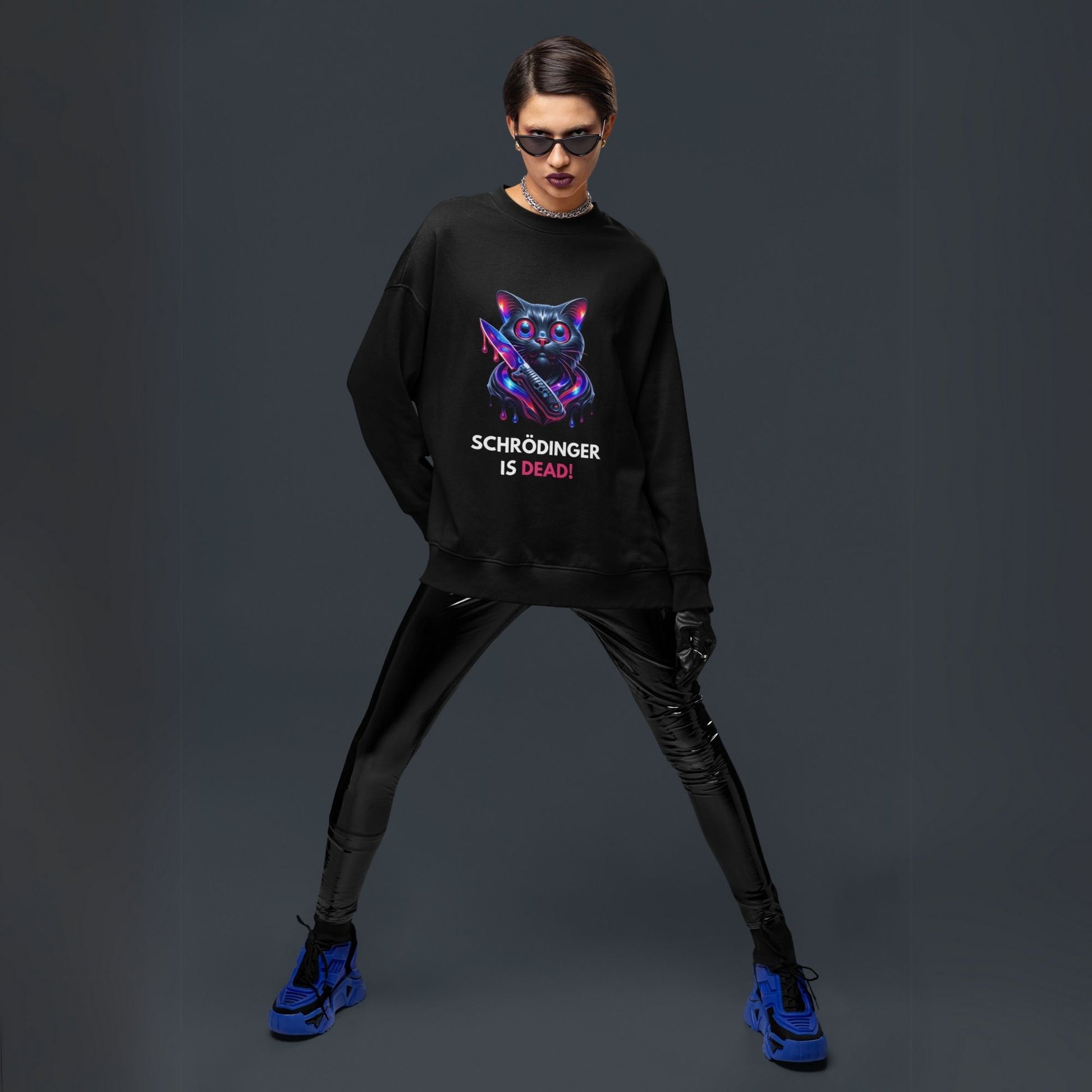 Schrödinger is dead Black Cat Sweatshirt in black, made from organic cotton. Model showcasing the sweatshirt styled with vegan leather leggings.