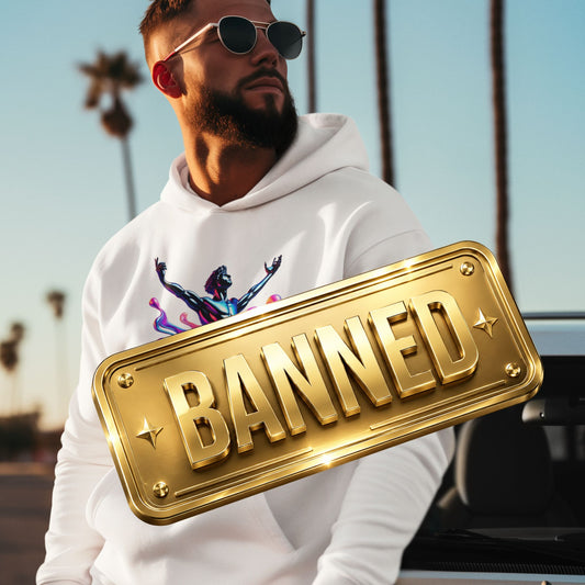 Man wearing a white hoodie with a colorful design and 'BANNED' sign in front of a blurred outdoor background.