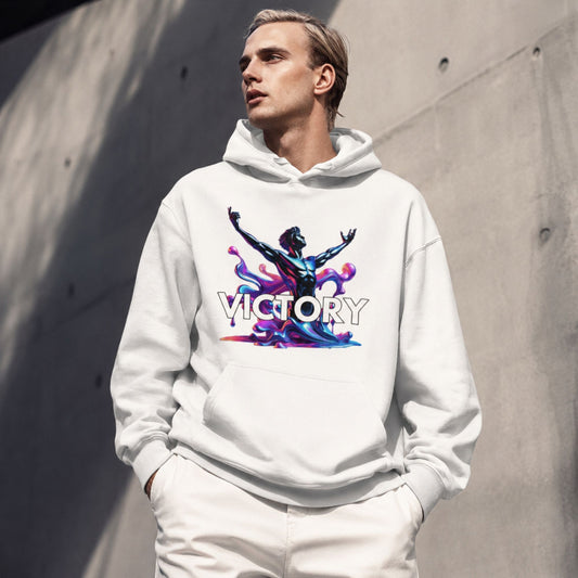 Man wearing a white hoodie with 'VICTORY' design in an urban setting