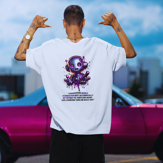 World Domination Shirt in white, made from organic cotton in conversion. Back view showcased by a model in front of a pink car.