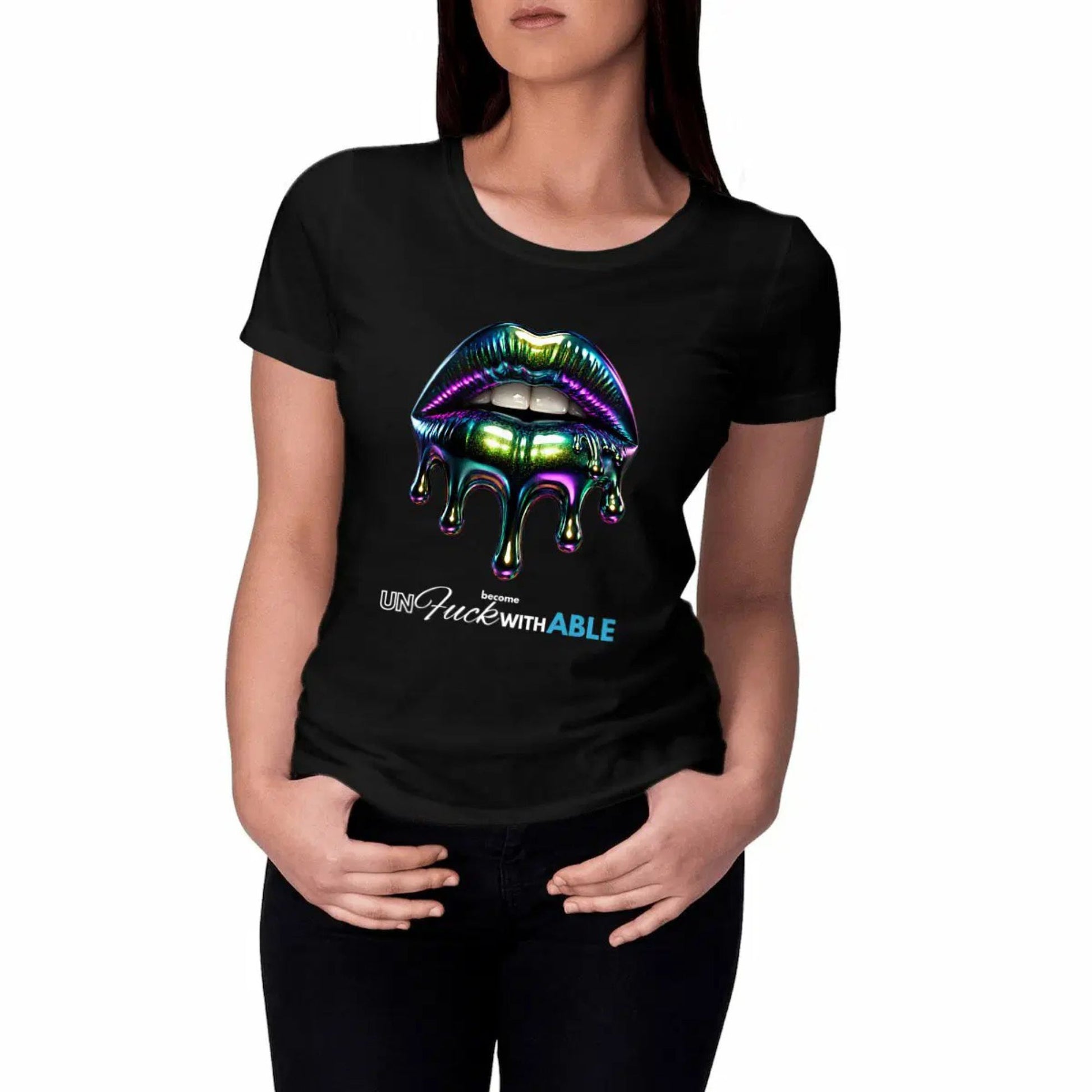 Black t-shirt with colorful lips graphic and text worn by a person on a white background