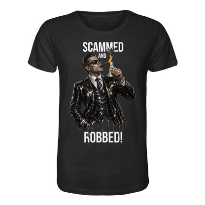 Black t-shirt with graphic of a man in a suit and sunglasses, holding a dollar bill, with text 'Scammed and Robbed!' on a white background.