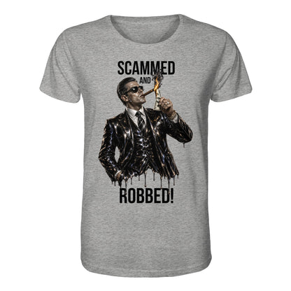 Gray t-shirt with a graphic of a man in a suit and sunglasses, holding a dollar bill, with text 'Scammed and Robbed!' on a white background.