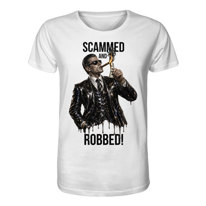 White t-shirt with graphic of a man in a suit and sunglasses, holding a dollar bill, with text 'Scammed and Robbed!' on a white background.